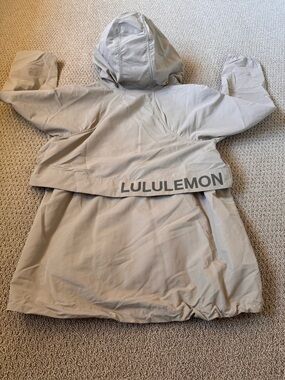 Lululemon Half Zip Rain/Wind Jacket. In excellent condition; sz 4